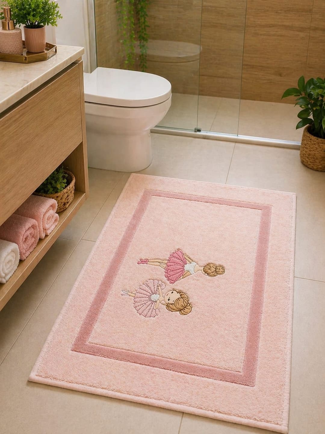 Tapete de banheiro rosa claro bordado com bailarinas